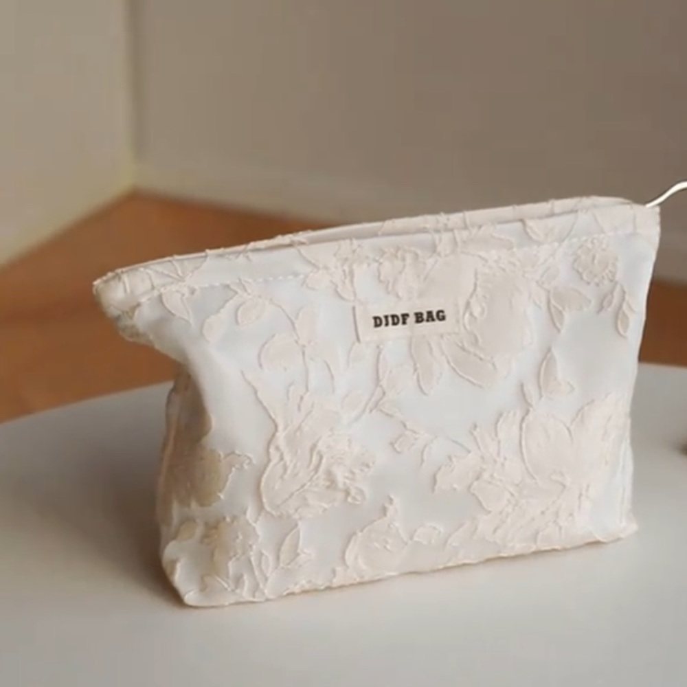 Cream Embossed with Tan Flower Makeup Case